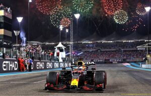Max-Verstappen-in-front-of-Abu-Dhabi-fireworks-planetF1